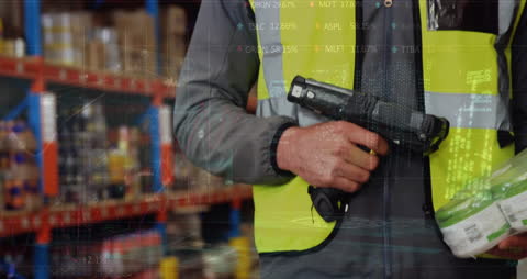 Warehouse Worker Using Bar Code Scanner in Logistics Hub
