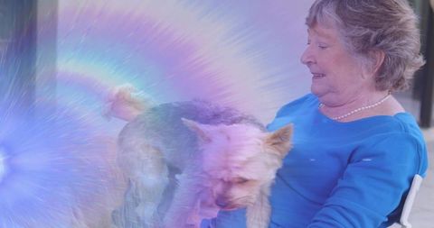 Elderly Woman with Dog Amidst Elegant Swirling Lights
