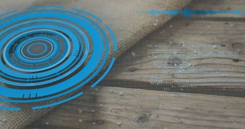 Blue futuristic hud interface overlaying rustic wooden table and burlap texture for ui