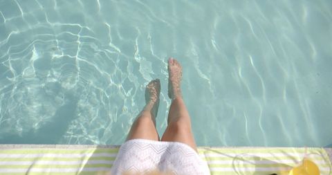 Relaxing by Poolside with Feet Dipping in Water - Download Free Stock Images Pikwizard.com