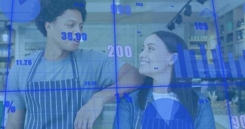 Smiling cafe staff collaborating behind counter with blue data overlay and charts