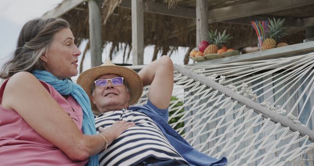 Senior Couple Relaxing in Hammock on Tropical Vacation - Download Free Stock Images Pikwizard.com