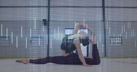 Flexible Gymnast Performing Intense Focused Stretching Routine