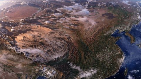 Epic view of diverse terrain from space with mountains and coasts