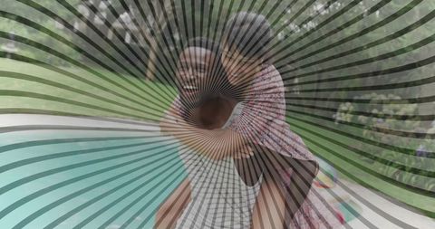 Joyful couple having fun by backyard pool in summer