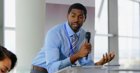Confident African American Businessman Presenting at Seminar