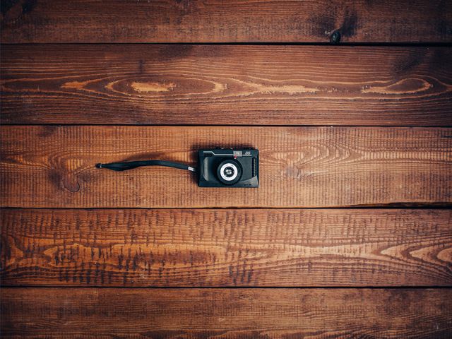 Vintage Film Camera on Wooden Surface - Download Free Stock Photos Pikwizard.com