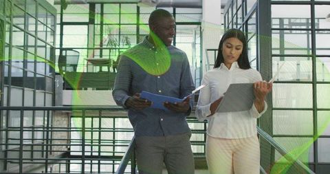 Coworkers with Tech Projects on Modern Staircase