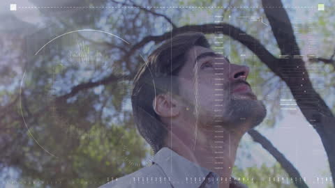 Man Analyzing Data in Forest with Digital Overlays