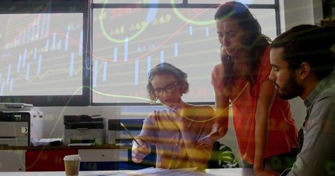 Team Collaborating on Financial Strategy with Data Analysis