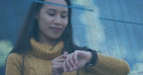 Woman Engaging with Smartwatch and Digital Data Overlay