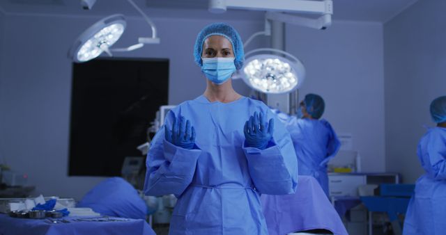 Confident Surgeon Preparing for Operation in Modern Operating Room - Download Free Stock Images Pikwizard.com