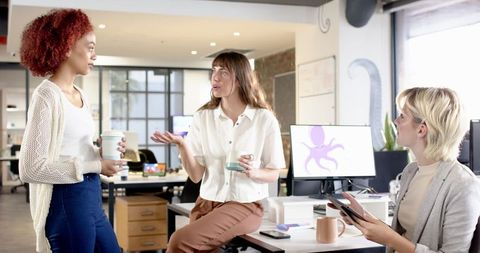 Diverse Team Collaboration in Contemporary Office Setting