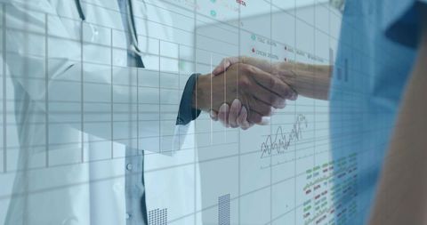 Doctors shaking hands overlaid with medical charts and healthcare analytics