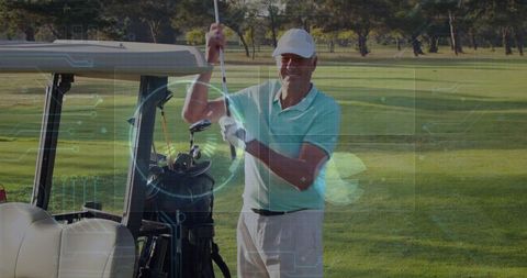 Senior golfer prepares swing on sunlit green fairway