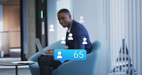 Businessman Analyzing Engagement with Digital Interface Icons - Download Free Stock Images Pikwizard.com