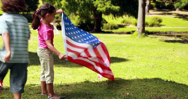 Children Holding American Flag in Park - Download Free Stock Images Pikwizard.com