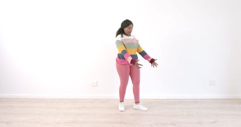 Joyful expression during solo dance