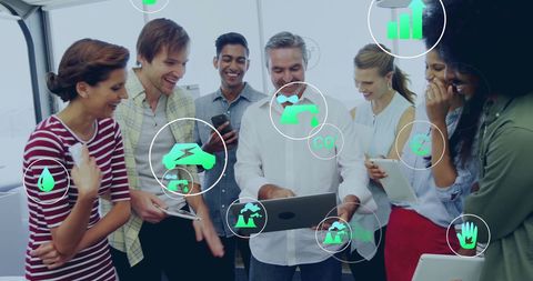 Diverse Business Team Analyzing Eco-Friendly Data in Modern Office - Download Free Stock Images Pikwizard.com