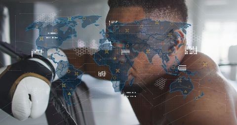 Gloved boxer leaning on ropes studying futuristic world map hud during training