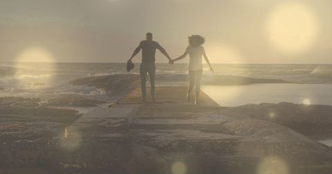Romantic African American Couple Running at Sunset