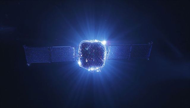 Glowing Cube-Shaped Satellite Emitting Blue Light in Deep Space