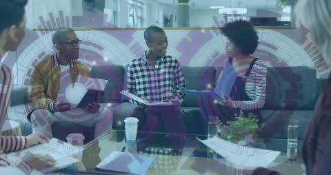 Modern Business Meeting with Futuristic Digital Interface Overlay