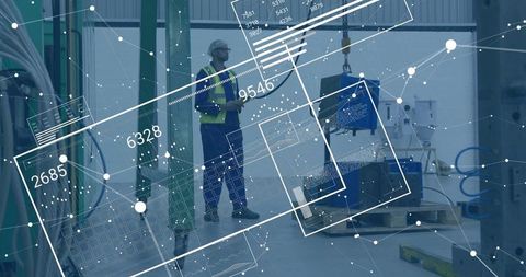 Factory engineer analyzing component with tech data overlays