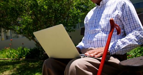 Senior Man with Laptop Sitting on Garden Bench Outdoor - Download Free Stock Images Pikwizard.com