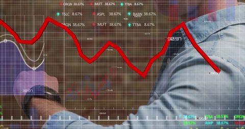 Businessman analyzing data with stock market decline graph