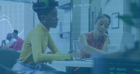 Focused Coworkers Collaborating in Modern Office Environment