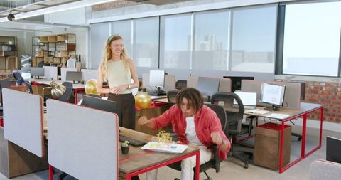 Office Birthday Celebration with Cake and Joyful Colleagues