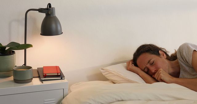 Woman Resting in Bed with Cough, Cozy Bedroom at Night - Download Free Stock Images Pikwizard.com