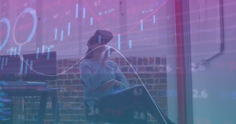 Businesswoman Analyzing Financial Data with VR Technology