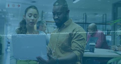 Focused Professionals Collaborating in Contemporary Open-Plan Office