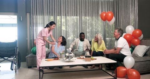 Welcoming ceremony in treatment center with nurse and patients