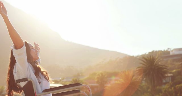 Young Woman in Wheelchair Raising Arms in Joy Outdoors - Download Free Stock Images Pikwizard.com