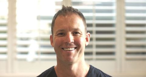 Smiling professional in casual setting