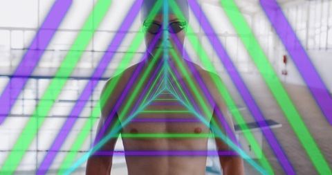 Swimmer Standing on Pool Deck with Neon Triangle Projection and Futuristic Geometric Light