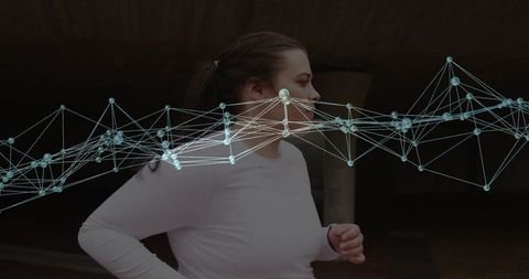 Woman running with digital network overlay representing fitness data and biometric tracking