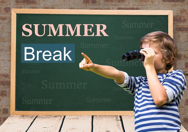 Young boy in casual striped shirt uses binoculars and points towards an imagined object while standing next to a chalkboard displaying 'Summer Break'. Great for promoting educational materials, summer vacation plans, adventure activities for children, or curiosity-themed content. Perfect for school newsletters, travel agency ads, or children's program advertisements.