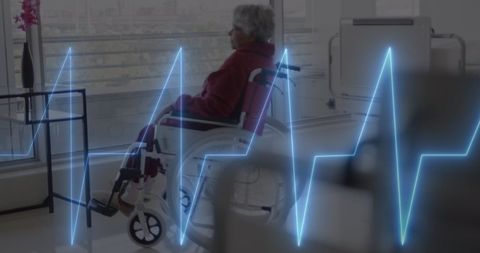 Senor Woman in Wheelchair with Cardiograph Line Overlay