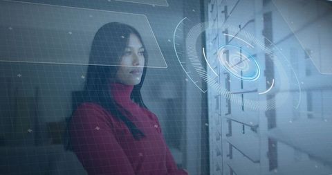 Woman researcher interacting with holographic hud above server rack in futuristic lab