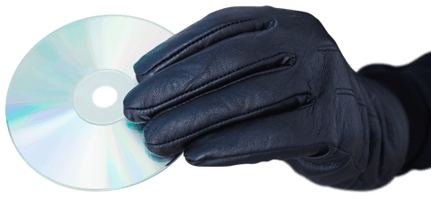 Transparent gloved hand holding cd emphasizing data protection