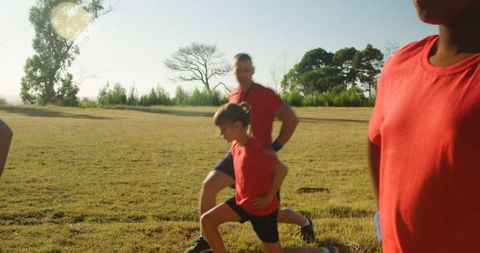 Active Boot Camp Training for Kids in Sunlit Outdoor Setting