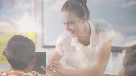 Teacher Assisting Boy with Tablet in Interactive Classroom Learning