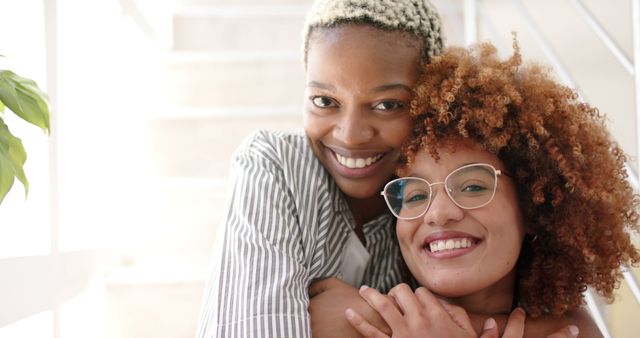 Happy African American Friends Hugging And Smiling Indoors - Download Free Stock Images Pikwizard.com