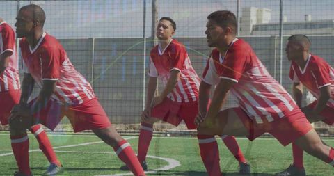 Football Players Stretching with Data Interface Overlay