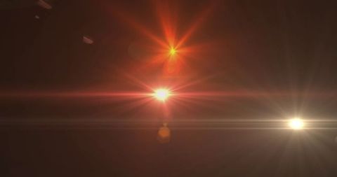 Abstract Glowing Light Flares in Dark Background - Download Free Stock Images Pikwizard.com