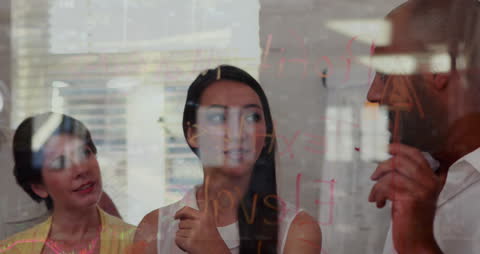 Diverse Business Team Discussing Strategy with Technology Overlay